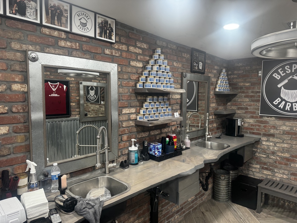 Layrite product display and branding at Bespoke Barber